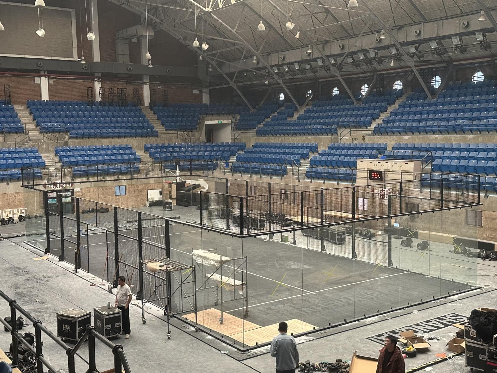 A PadelCourts+ glass court installed in a tournament arena